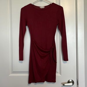Francesca’s long sleeve pink-red dress with wrap tie overlaying.